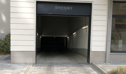 Spacious underground parking space near the main station for rent H=205cm