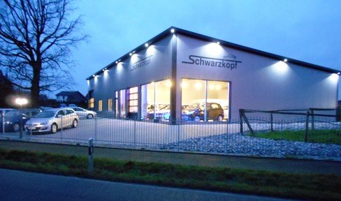 Commercial building conveniently located at present car dealership but versatile in use