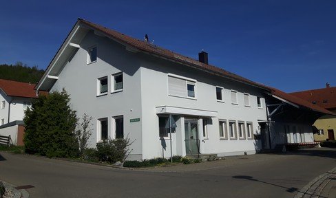 Office and warehouse building with manager's apartment, 2 garages and small garden
