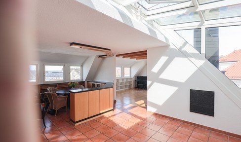 Bright spacious attic apartment in Weingarten with very good energy values. Central with basilica view.