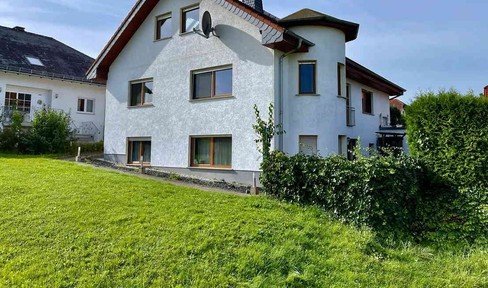 Spacious detached or semi-detached house with an apartment on the outskirts of the village