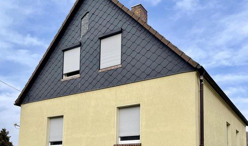 Einfamilienhaus mit großem Grundstück und vielfältigen Möglichkeiten in Muldestausee, Ortsteil Pouch