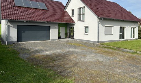 Detached house with garage outbuilding