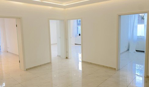 High-quality renovated apartment with unique terrace landscape - central & quiet location